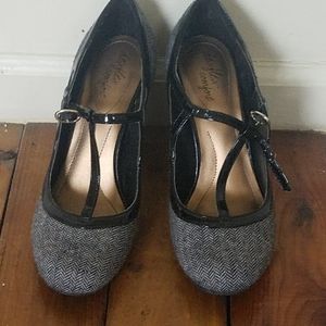 Black t-strap high heel shoes